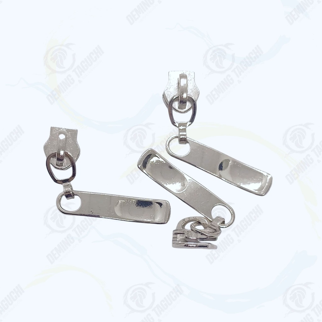 Deslizador Nylon PLATEADO #5, Llave Tobogan Nylon #5, Corredor Rey Nylon para cierre plástico #5, Jalador Rey para cremallera nylon #5, Carro Rey para cierre nylon #5, Deslizador Rey para cremallera plástica #5, Llave Rey para cierre nylon #5, Llave Rey para mochilas carteras y bolsos, Llave Rey para morrales y maletines, Llaves y corredores Rey para cremallera nylon, Repuestos Rey para cierre plástico, Accesorios Rey para cremallera nylon, Insumos de costura Rey, Artículos de mercería, Repuestos para mochilas y carteras, Venta por mayor y menor Perú.